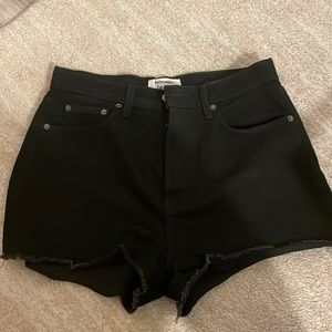 Reformation denim black jean shorts. Size 28.